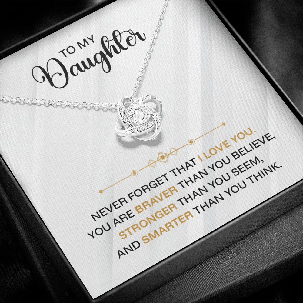 Silver jewelry pendant engraved with "To My Daughter Never Forget I Love You" for a sentimental gift.