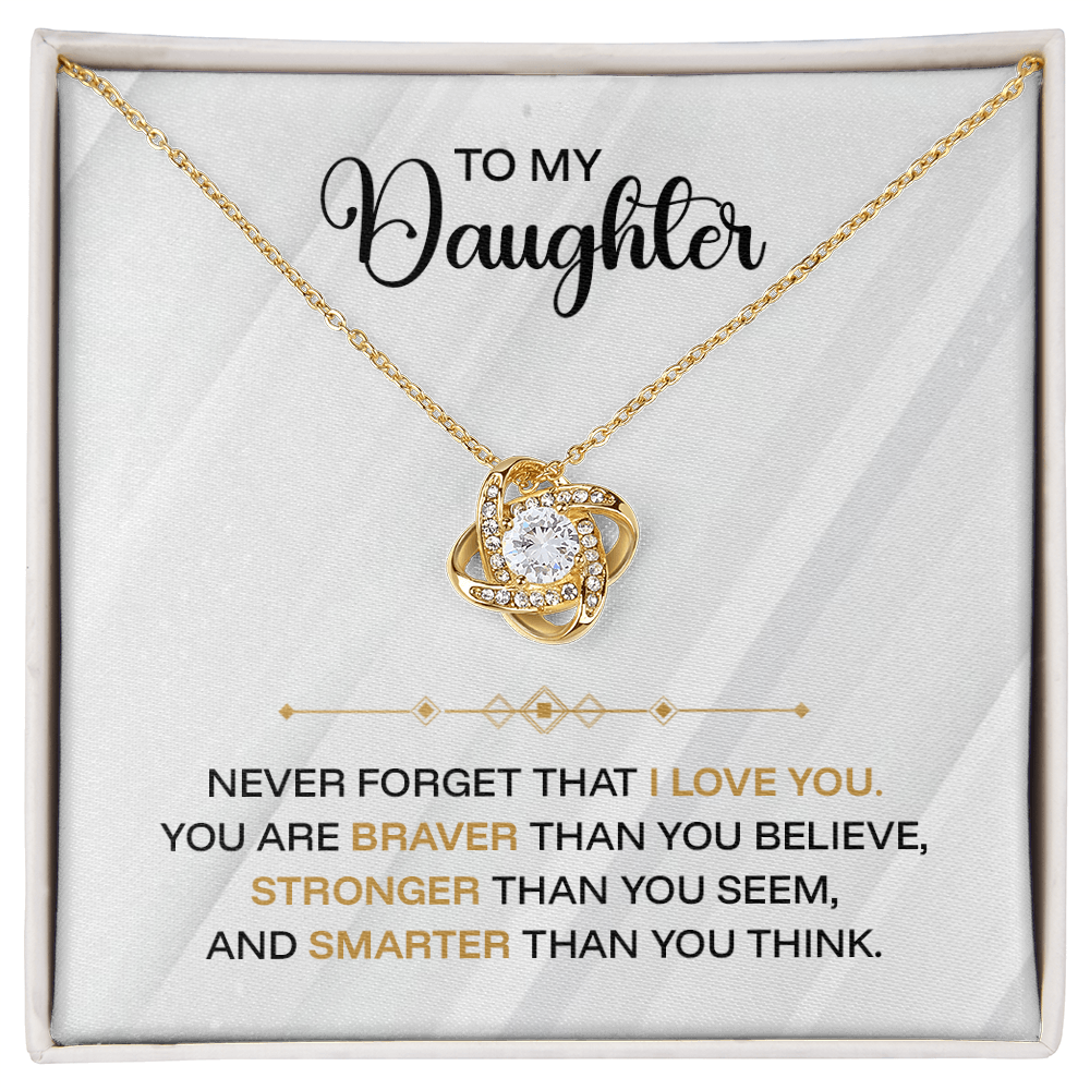 Silver jewelry pendant engraved with "Never Forget I Love You" for daughter, crafted by ShineOn Fulfillment.