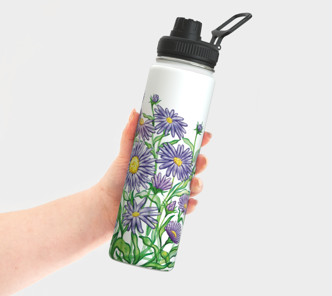 Hand holding a floral-patterned Aster birth flower water bottle with black lid on a white background