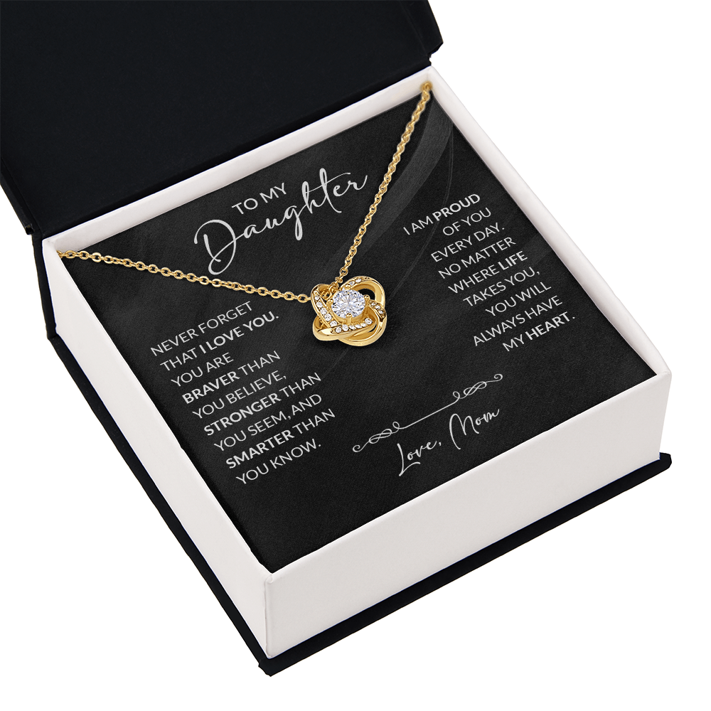 Silver jewelry piece with engraved "To My Daughter — Braver Than You Believe" message, crafted by ShineOn Fulfillment.