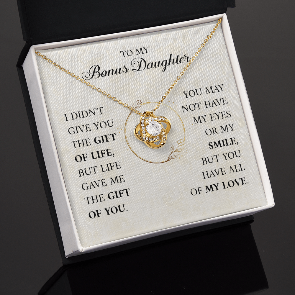 ShineOn Fulfillment jewelry showing a heartfelt "To My Bonus Daughter — Gift of Life" message pendant on a chain.
