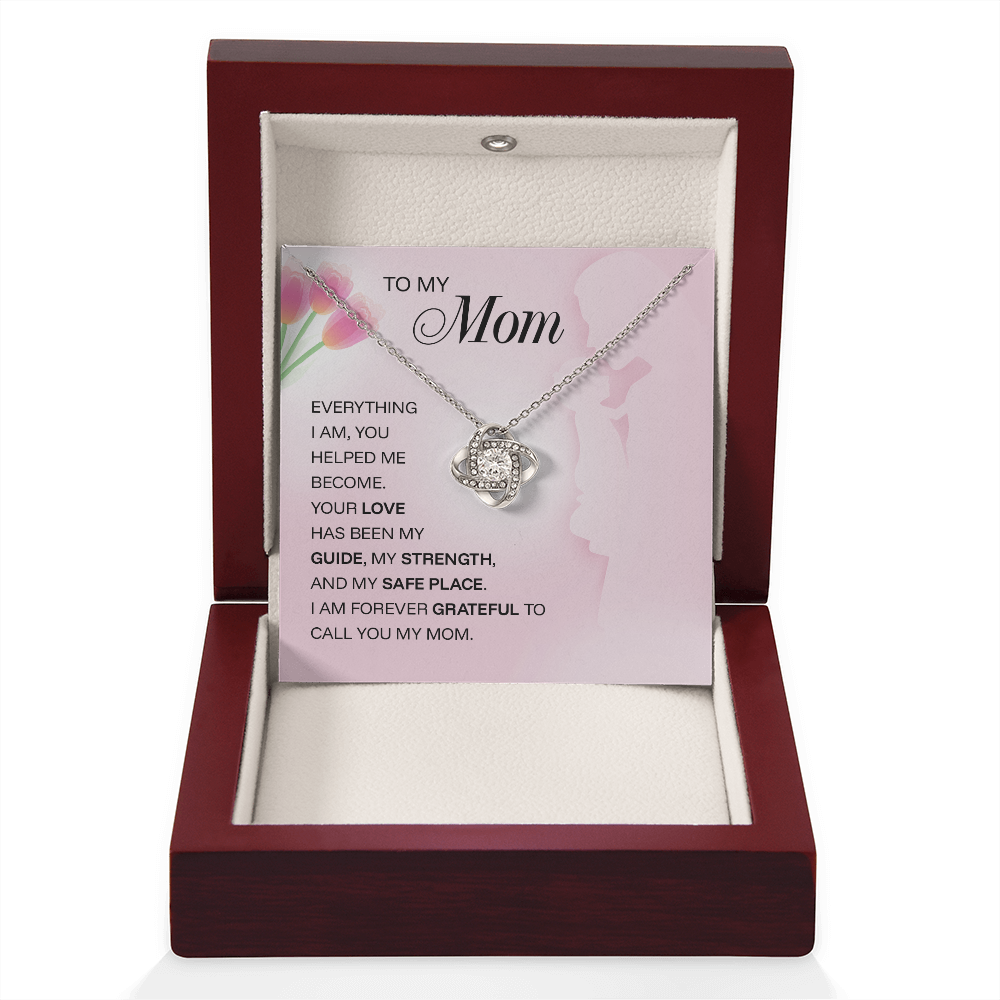ShineOn Fulfillment jewelry pendant engraved with "To My Mom – Everything I Am" for Mother's Day gift, close-up of the engraved jewelry piece.